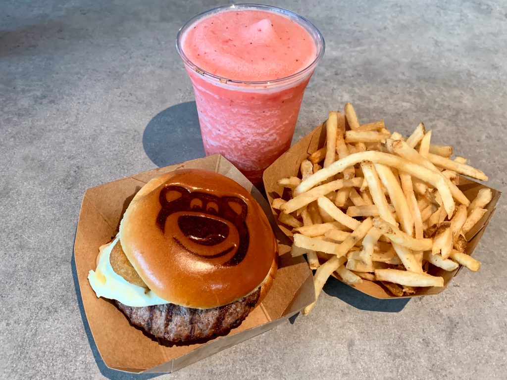 Hamburger with Lotso stamped into bun, french fries and strawberry smoothie